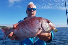 Pesca al luccioperca con la tinca